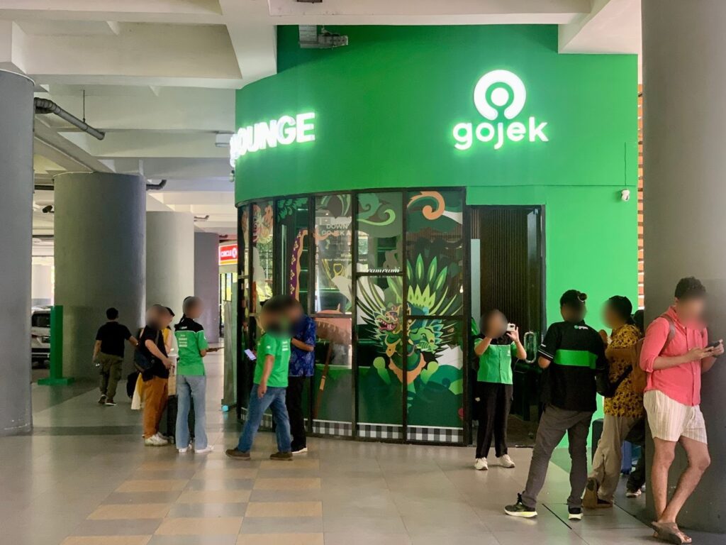Official Gojek office and service counter at Bali Denpasar Airport
