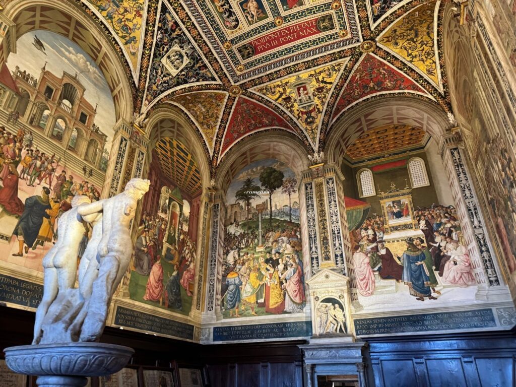 Is Siena Italy Worth Visiting? A Realistic 2026 Day Trip Guide Vibrant frescoes in Piccolomini Library within Siena Duomo